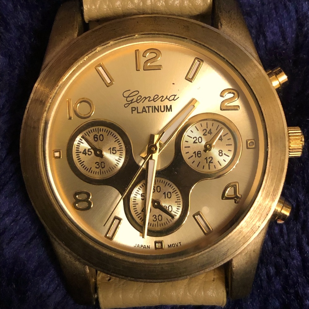 Geneva Platinum wristwatch, with mixed silver tone and brushed metal case,